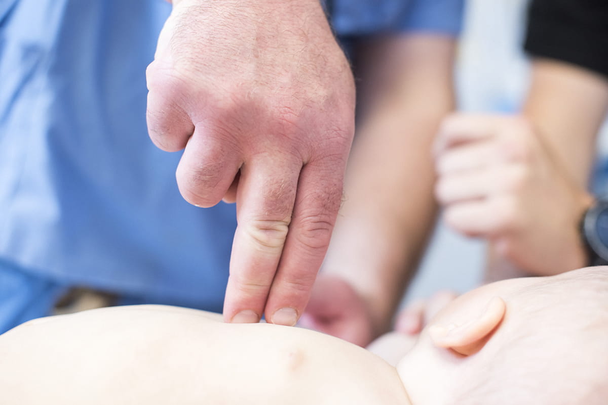 doctor pediatric cpr two finger